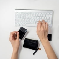 woman at keyboard with credit card